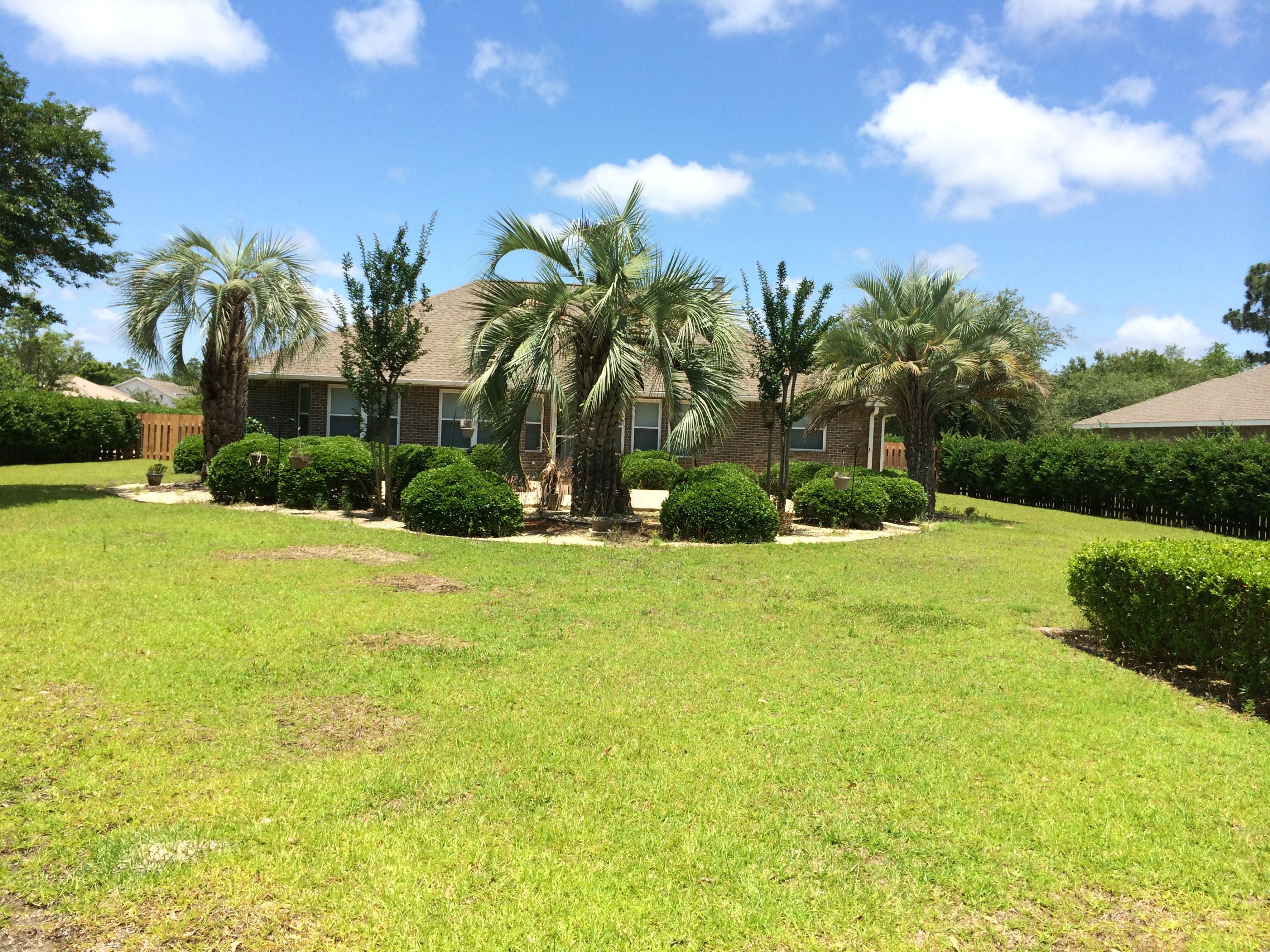 2557 Crescent Road Navarre, FL 32566 - Photo 15 of 48 a view of swimming pool and lake view