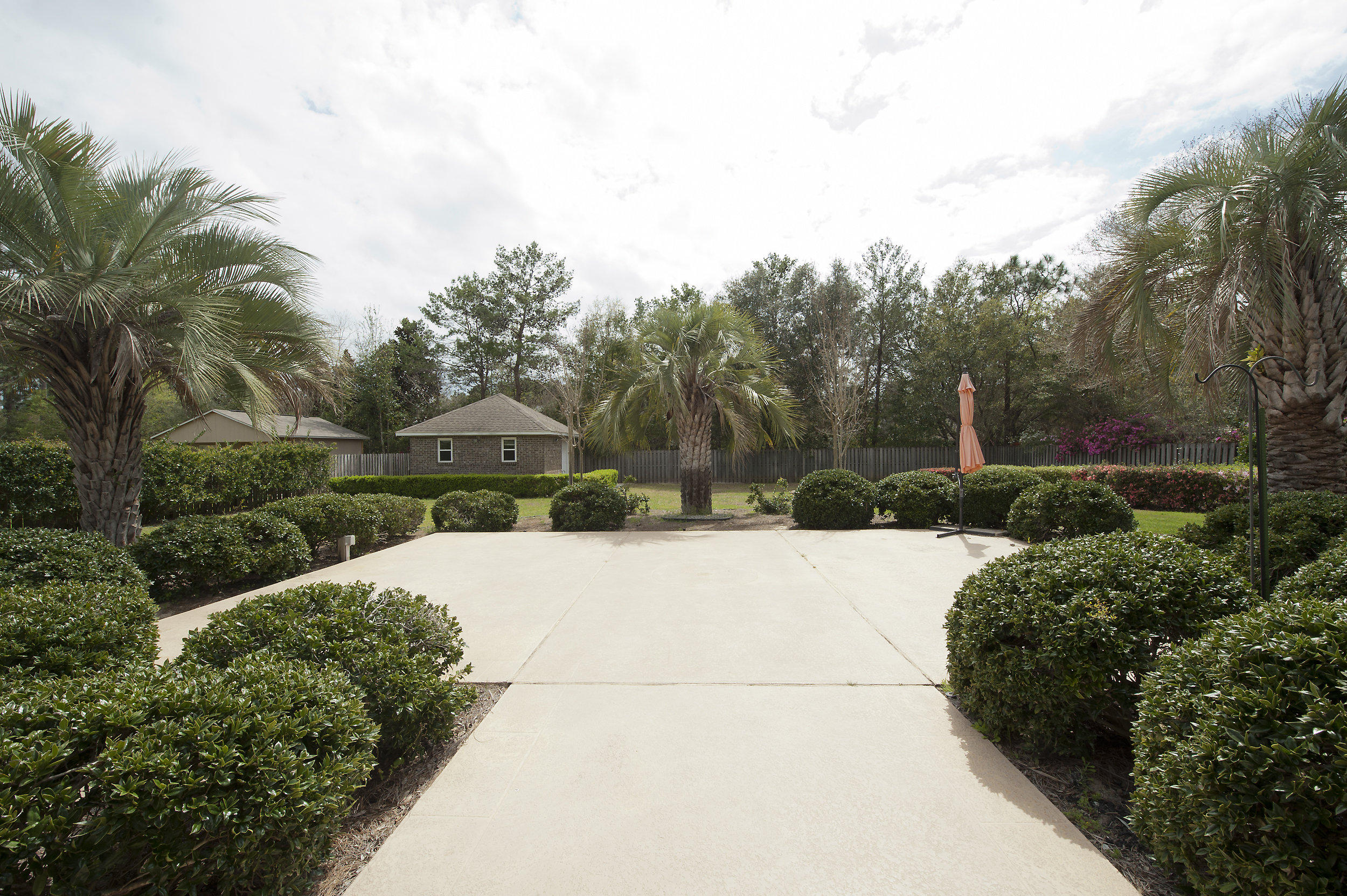 2557 Crescent Road Navarre, FL 32566 - Photo 18 of 48 a view of a backyard