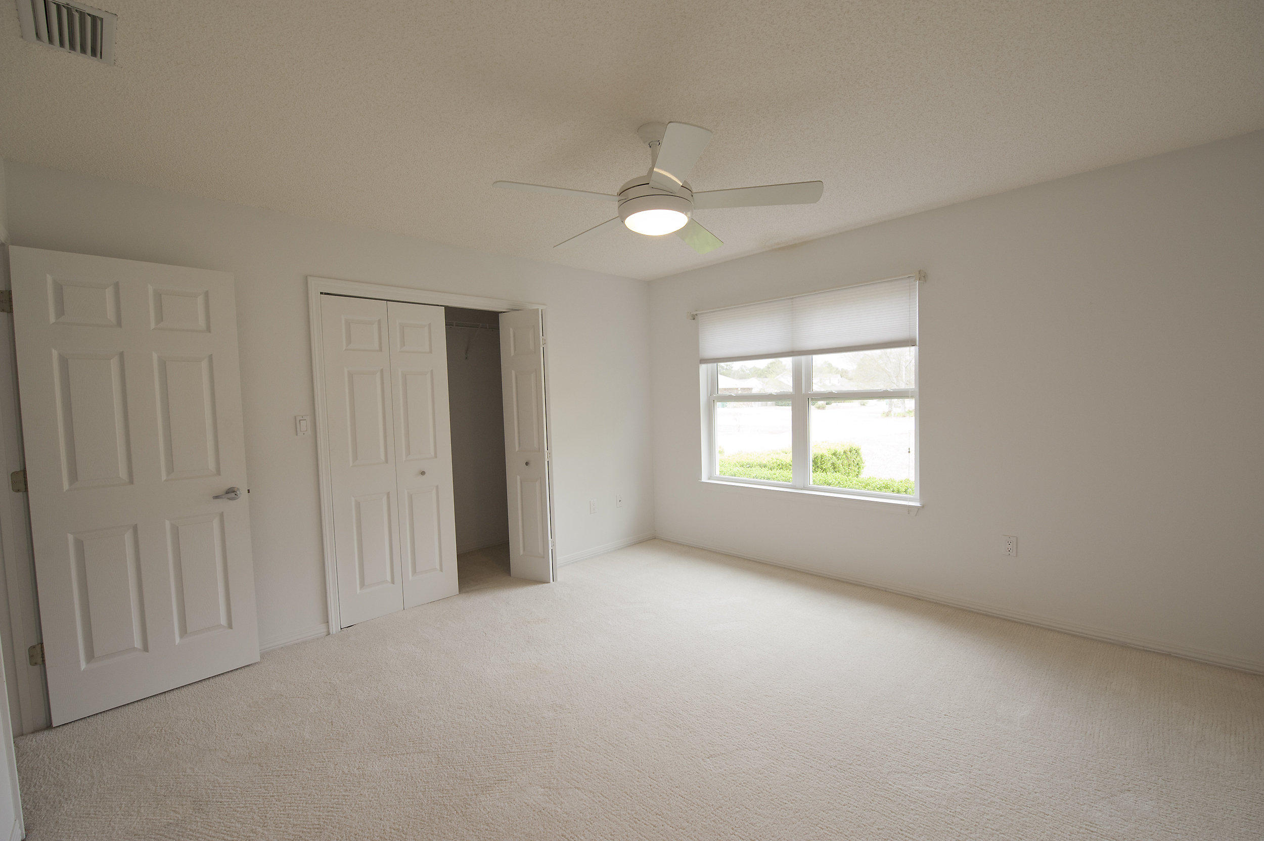 2557 Crescent Road Navarre, FL 32566 - Photo 20 of 48 a view of empty room with window