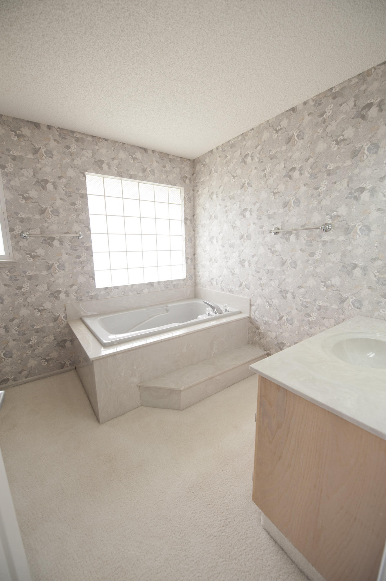 2557 Crescent Road Navarre, FL 32566 - Photo 45 of 48 a bath tub sitting in a bathroom next to a window