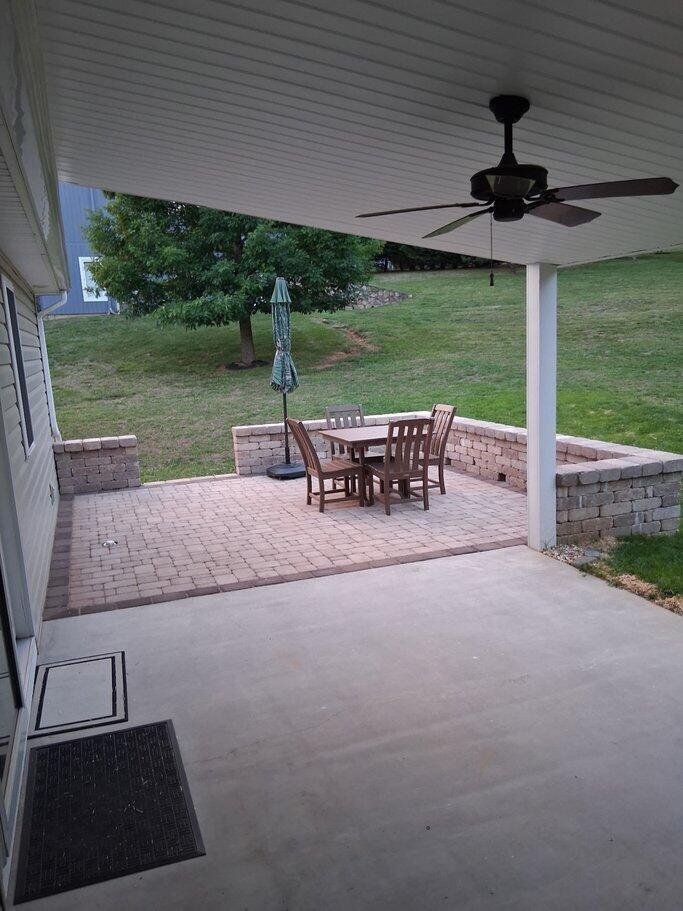 2348 East Ruritan Road Roanoke, VA 24012 - Photo 30 of 31 a view of a patio with a table chairs and a yard