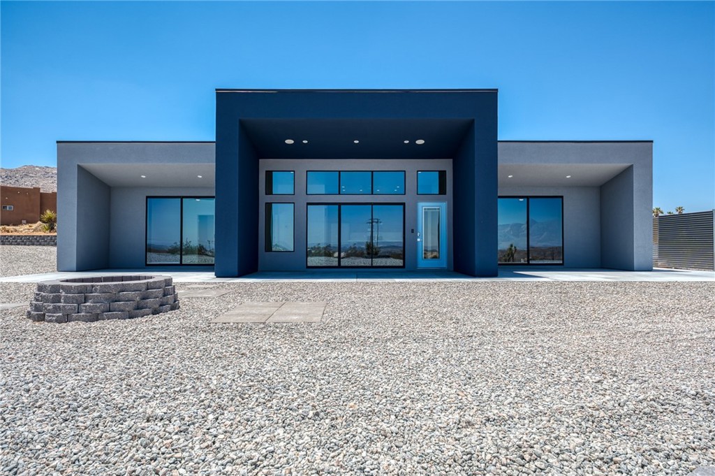 7079 Juniper Road Joshua Tree, CA 92252 - Photo 1 of 19 a view of an entryway of house