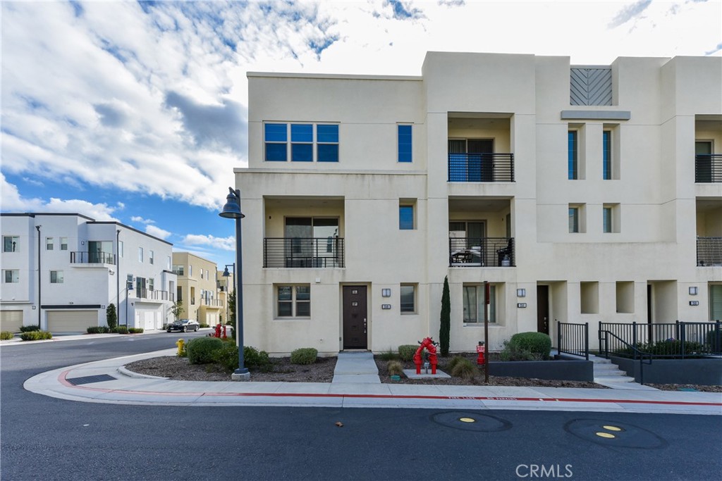 a front view of a building with street view