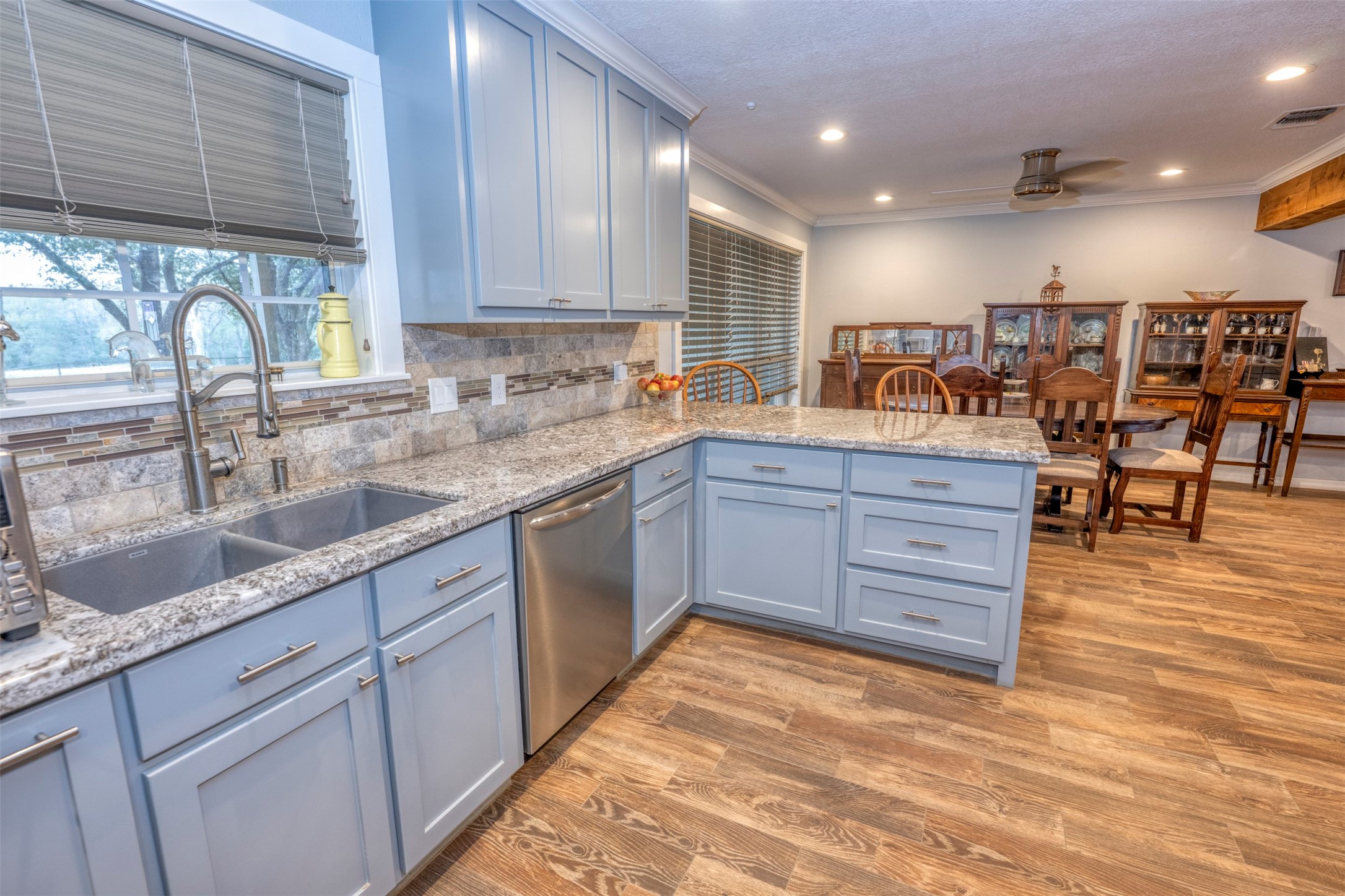 8775 Lone Star Road Washington, TX 77880 - Photo 11 of 44 a kitchen with lots of counter top space and a sink