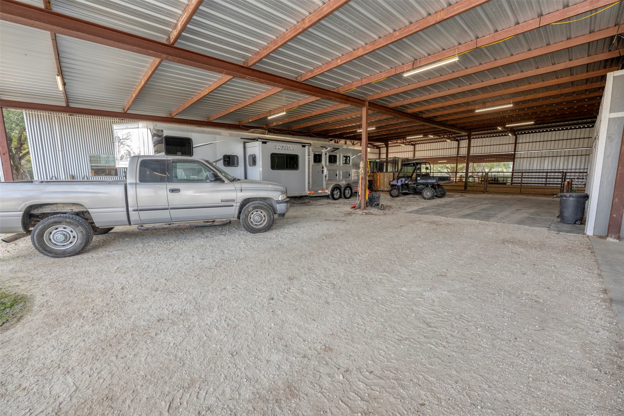 8775 Lone Star Road Washington, TX 77880 - Photo 33 of 44 a view of parking garage with cars