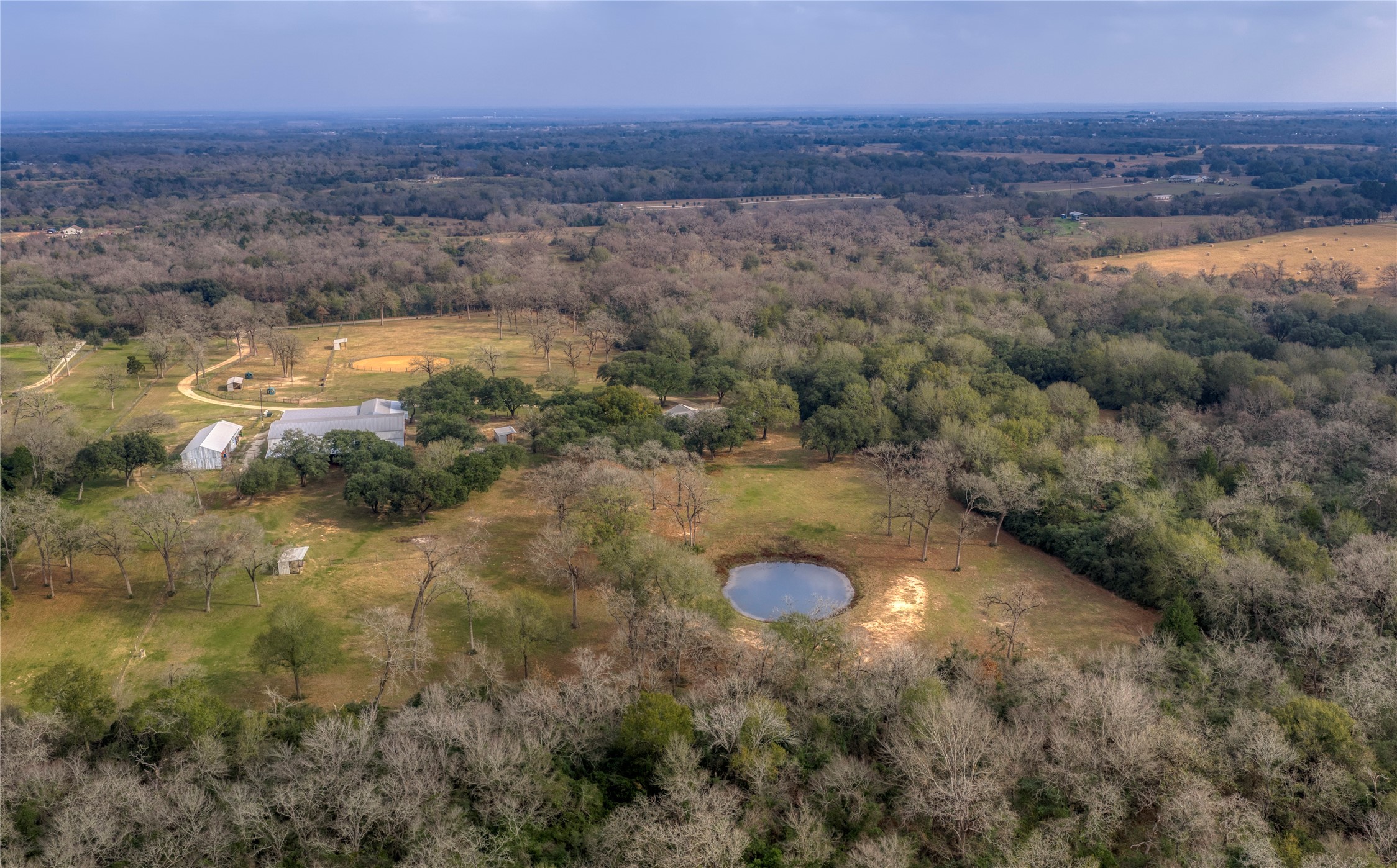 8775 Lone Star Road Washington, TX 77880 - Photo 7 of 44 a view of a lake with outdoor space