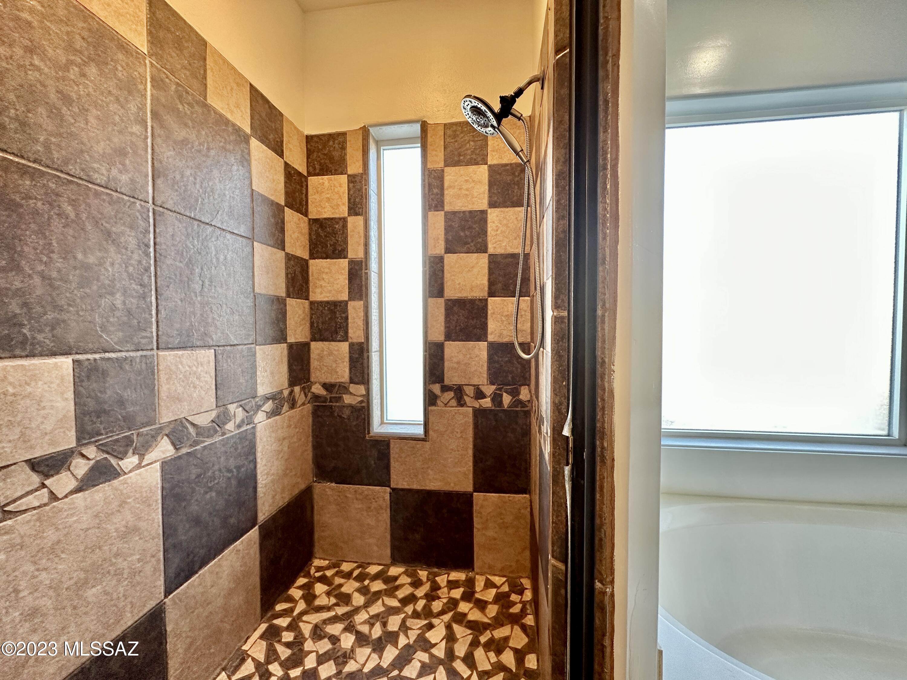 508 Eagle Meadow Loop Thatcher, AZ 85552 - Photo 17 of 32 a bathroom with a sink and a shower