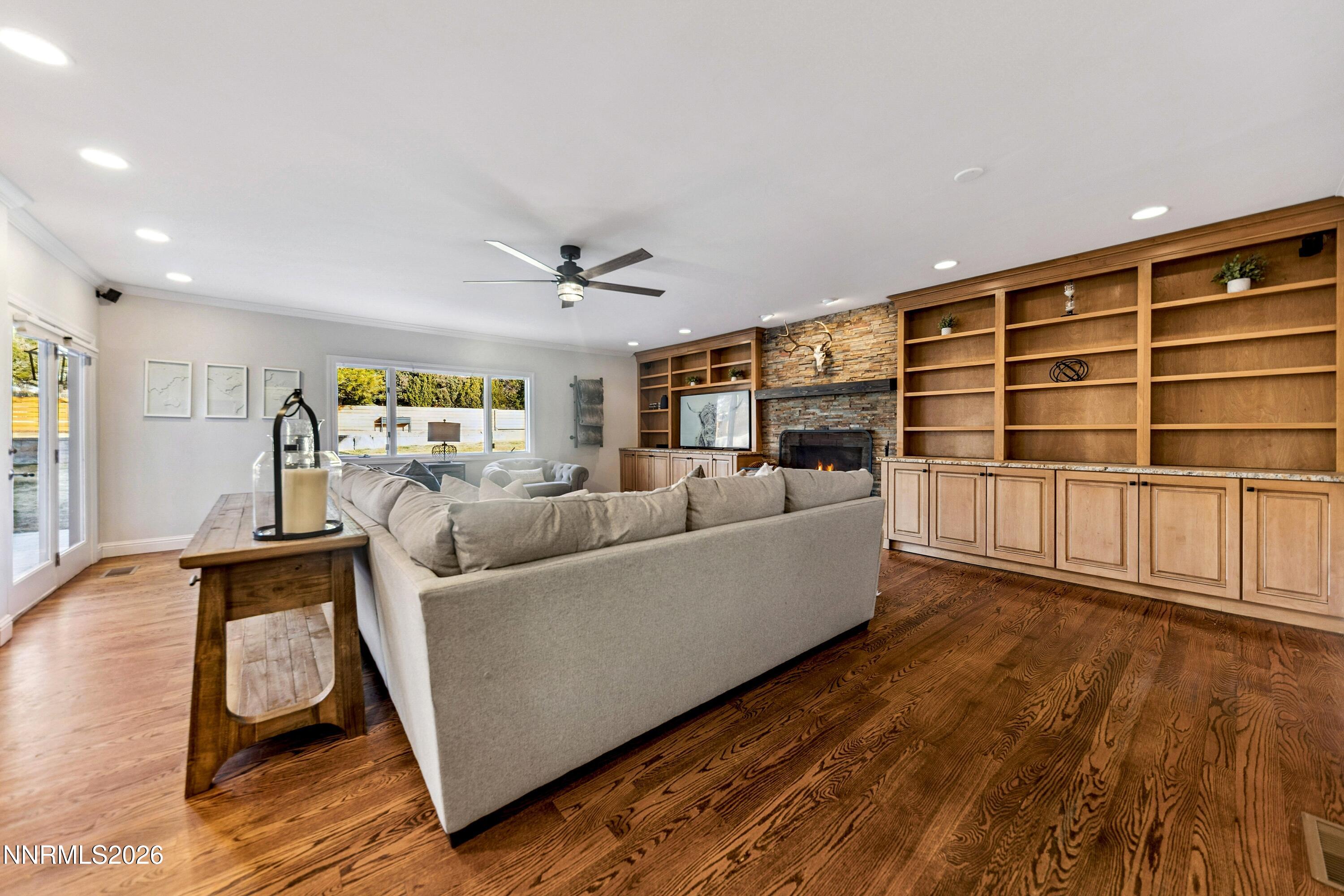 3620 East Hidden Valley Drive Reno, NV 89502 - Photo 27 of 67 a living room with furniture and a wooden floor