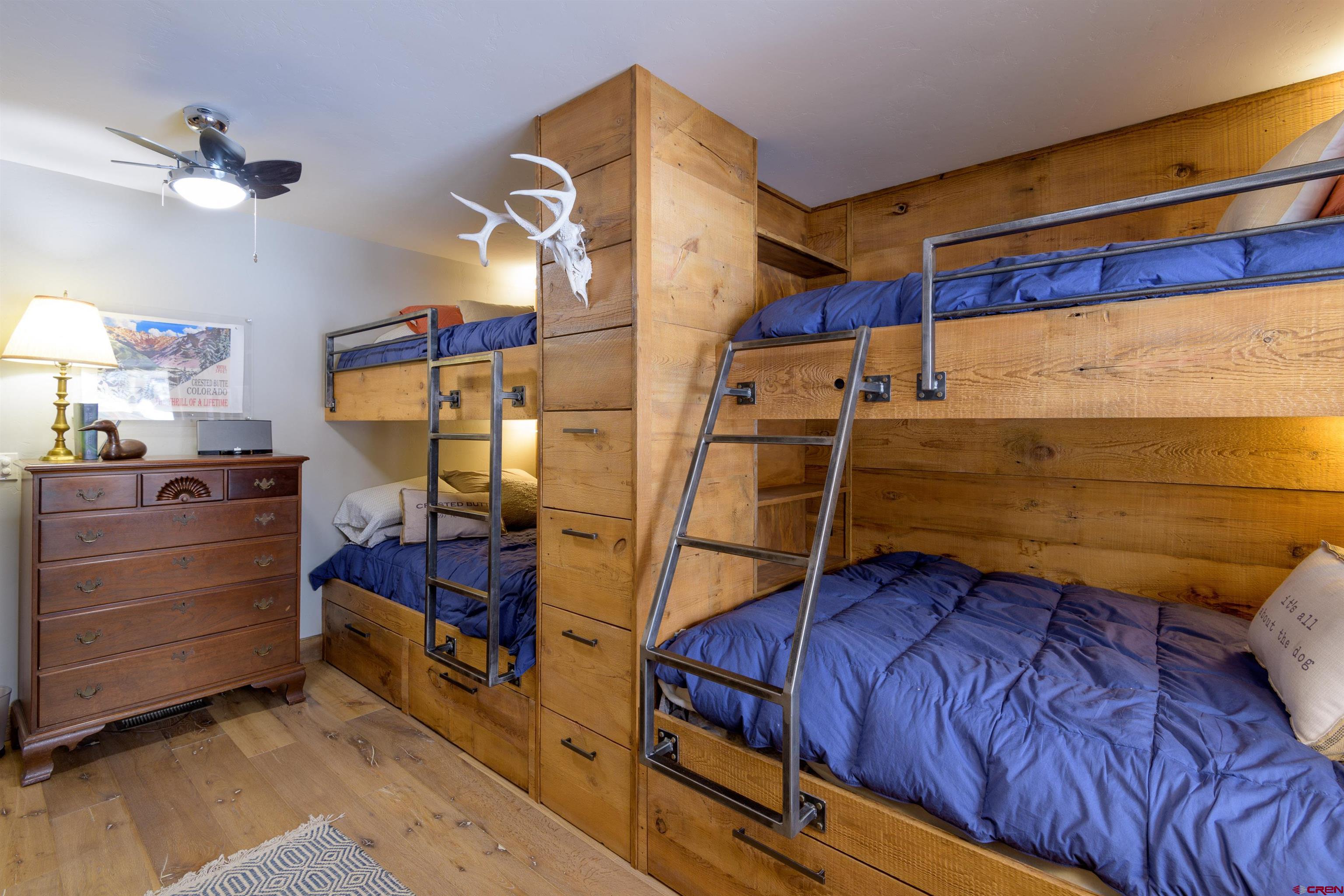 722 Elk Avenue Crested Butte, CO 81224 - Photo 22 of 32 a view of a room with wooden floor
