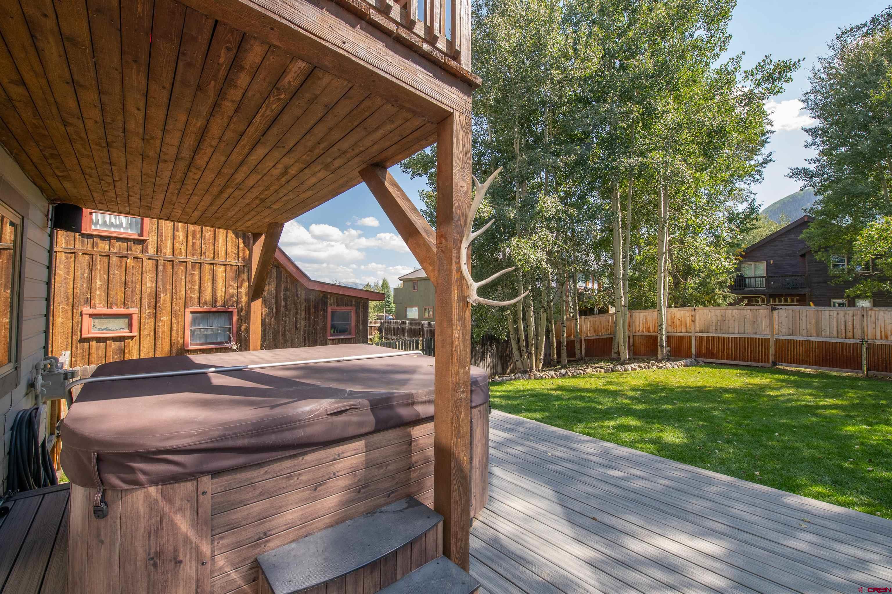 722 Elk Avenue Crested Butte, CO 81224 - Photo 8 of 32 a view of back yard of the house