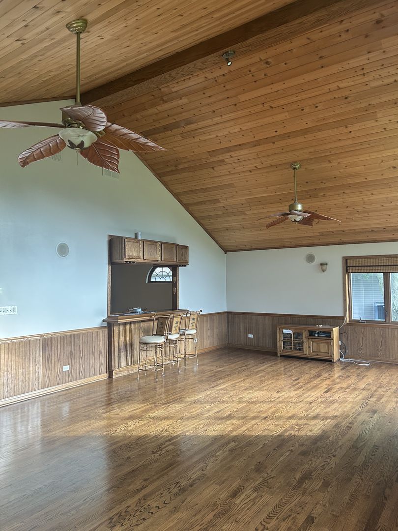 527 Springwood Lane Bolingbrook, IL 60440 - Photo 9 of 35 a view of a room with a table and chairs