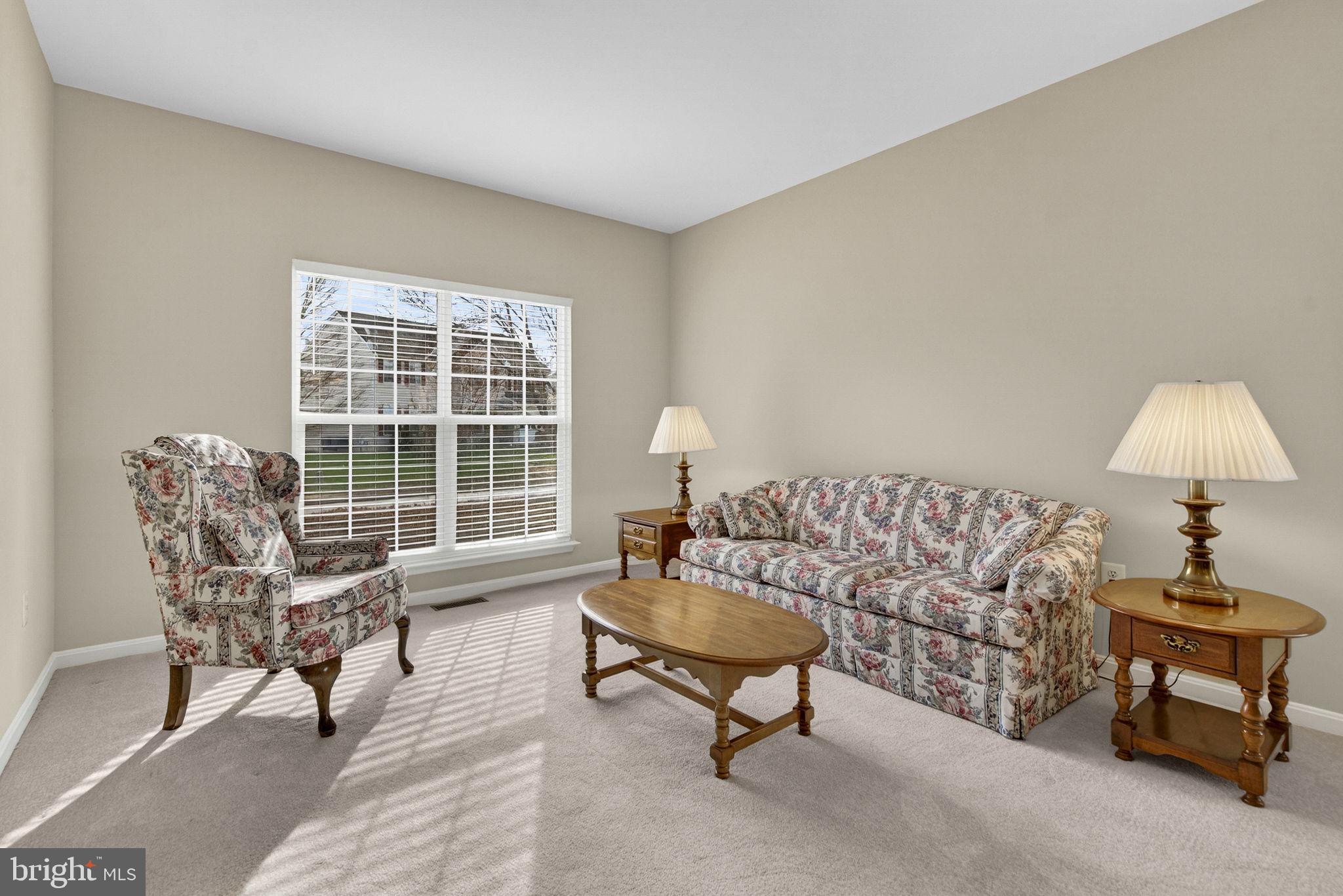 742 Blossom Tree Road Culpeper, VA 22701 - Photo 11 of 60 a living room with furniture and a window