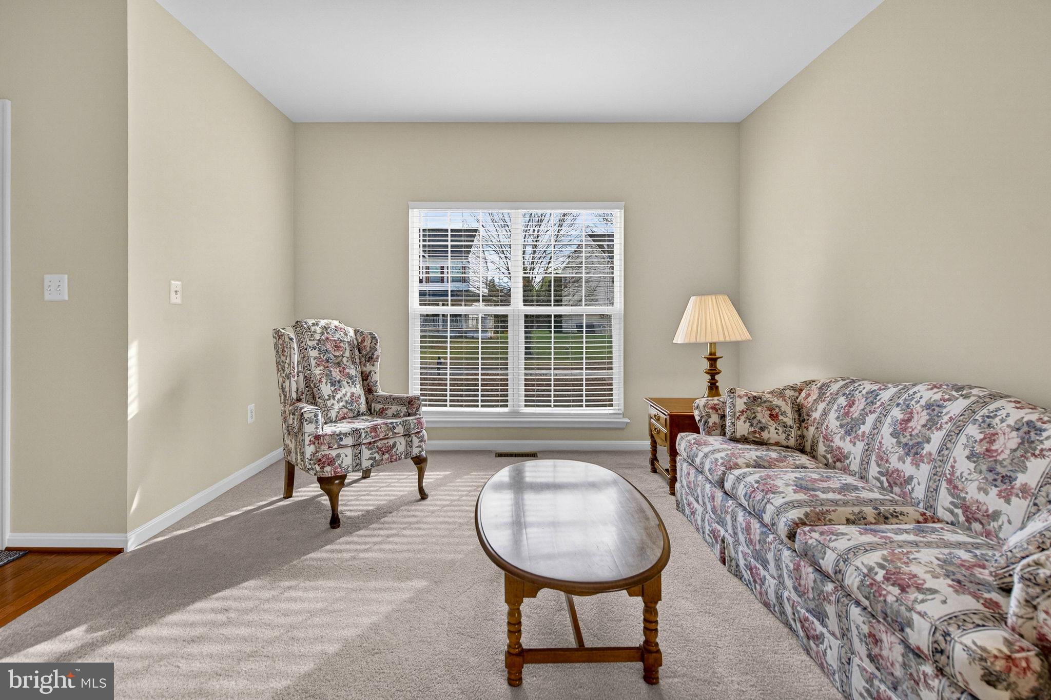 742 Blossom Tree Road Culpeper, VA 22701 - Photo 12 of 60 a living room with furniture and a window