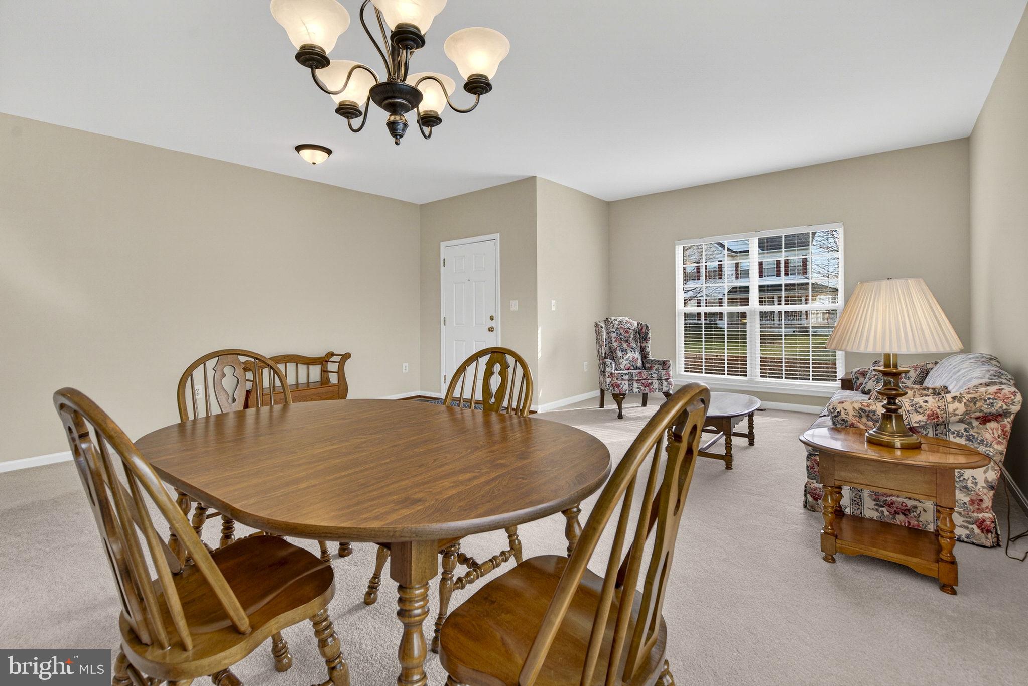 742 Blossom Tree Road Culpeper, VA 22701 - Photo 14 of 60 a dining room with furniture and window