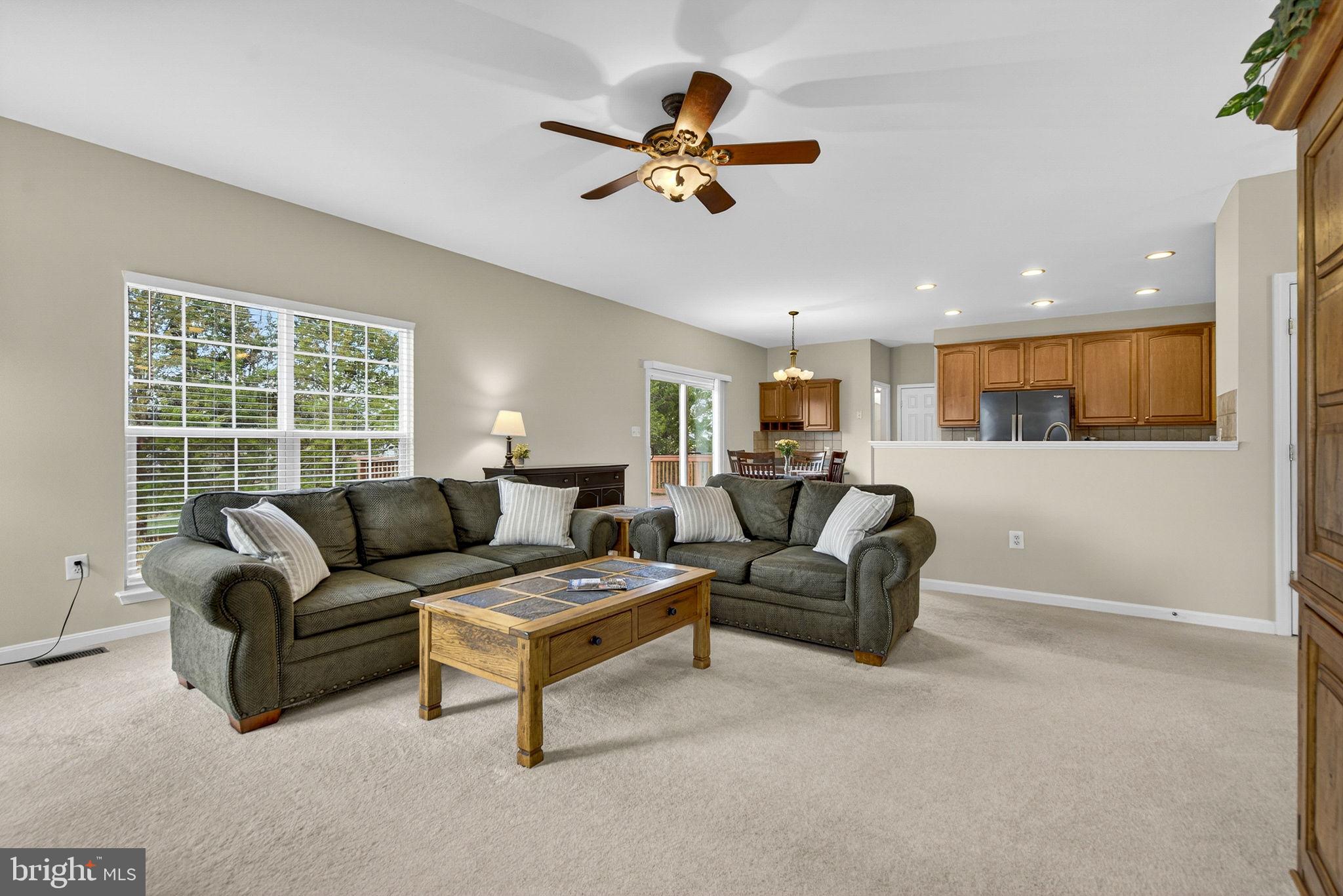 742 Blossom Tree Road Culpeper, VA 22701 - Photo 17 of 60 a living room with furniture and a window