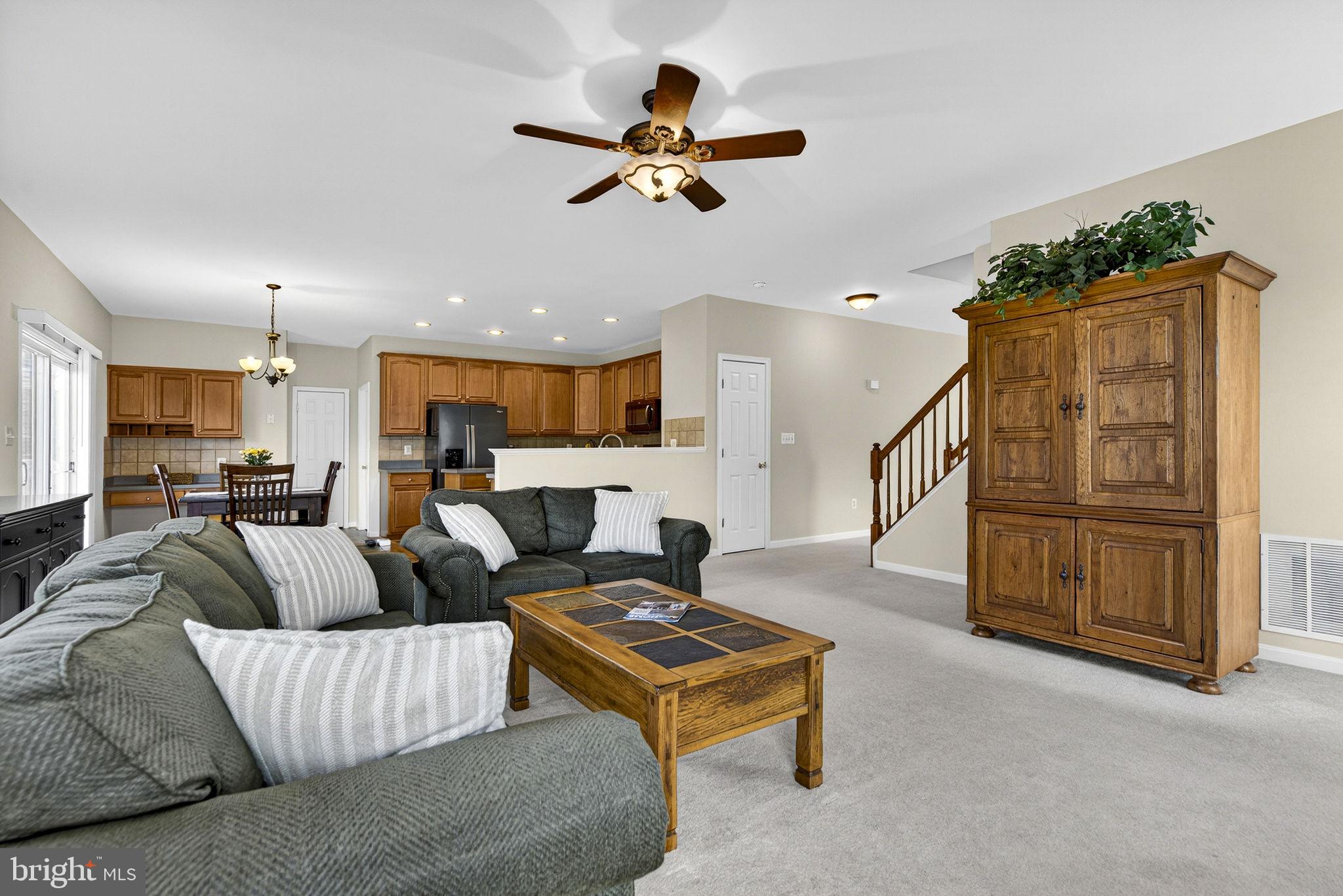 742 Blossom Tree Road Culpeper, VA 22701 - Photo 18 of 60 a living room with furniture and kitchen view