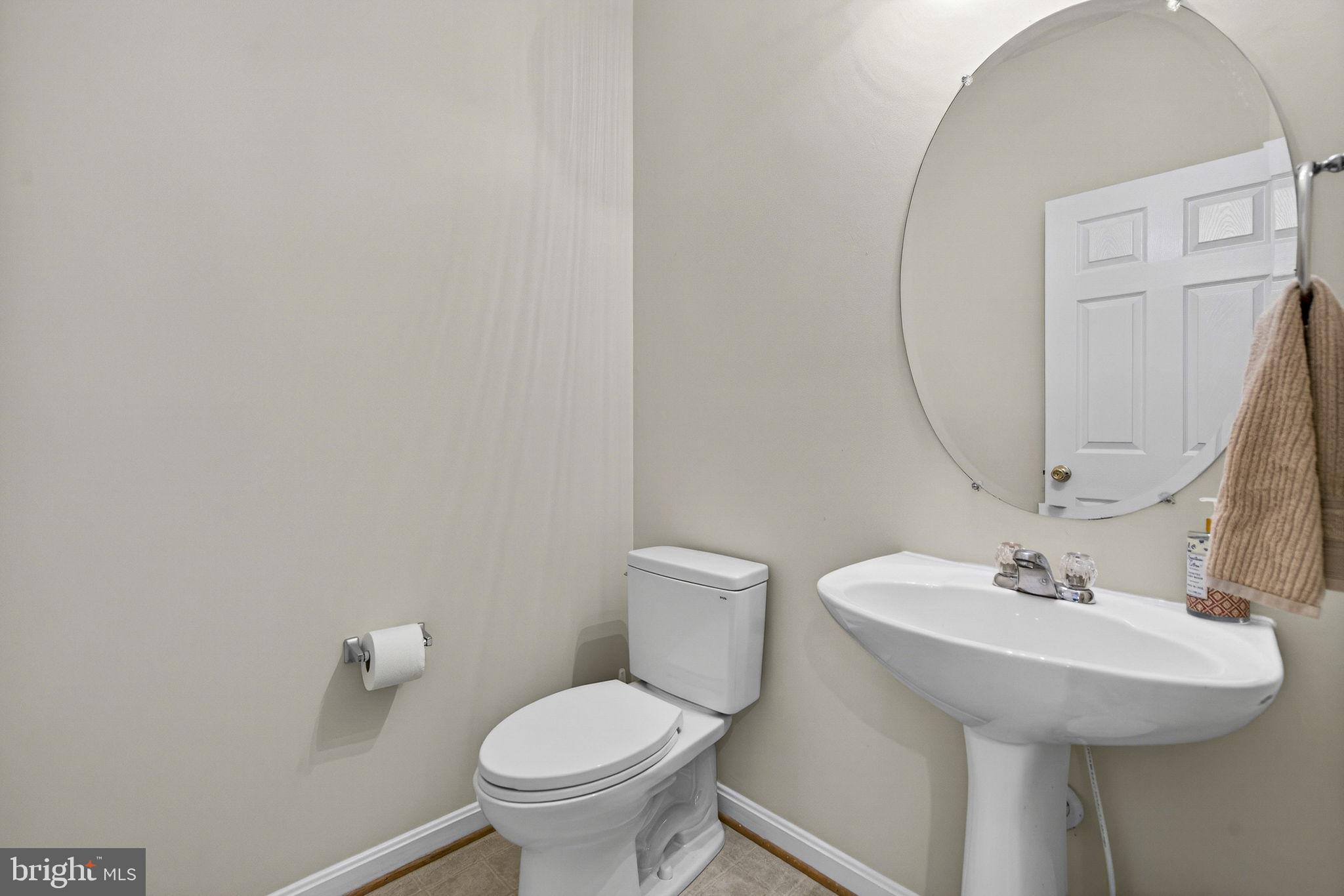 742 Blossom Tree Road Culpeper, VA 22701 - Photo 25 of 60 a bathroom with a sink and toilet