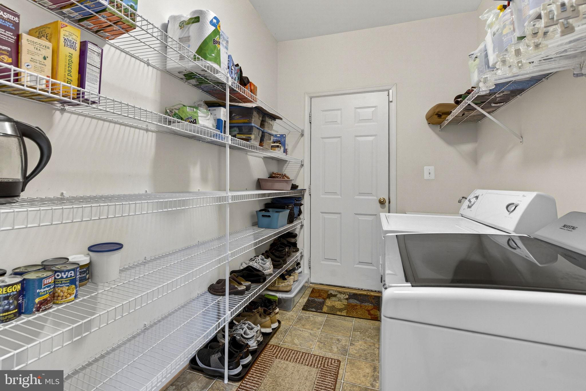 742 Blossom Tree Road Culpeper, VA 22701 - Photo 26 of 60 a utility room with dryer and washer