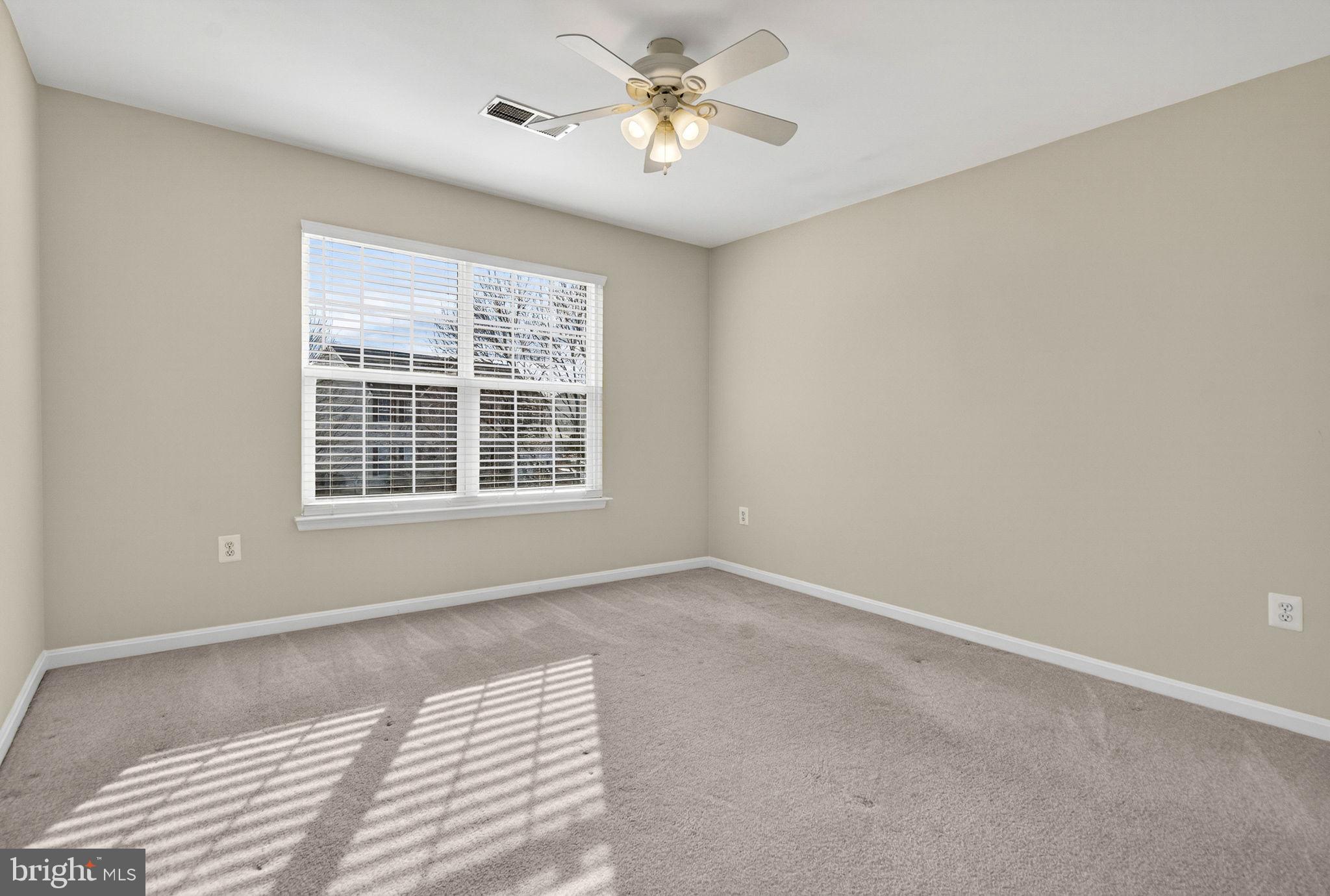 742 Blossom Tree Road Culpeper, VA 22701 - Photo 29 of 60 a view of an empty room with a window