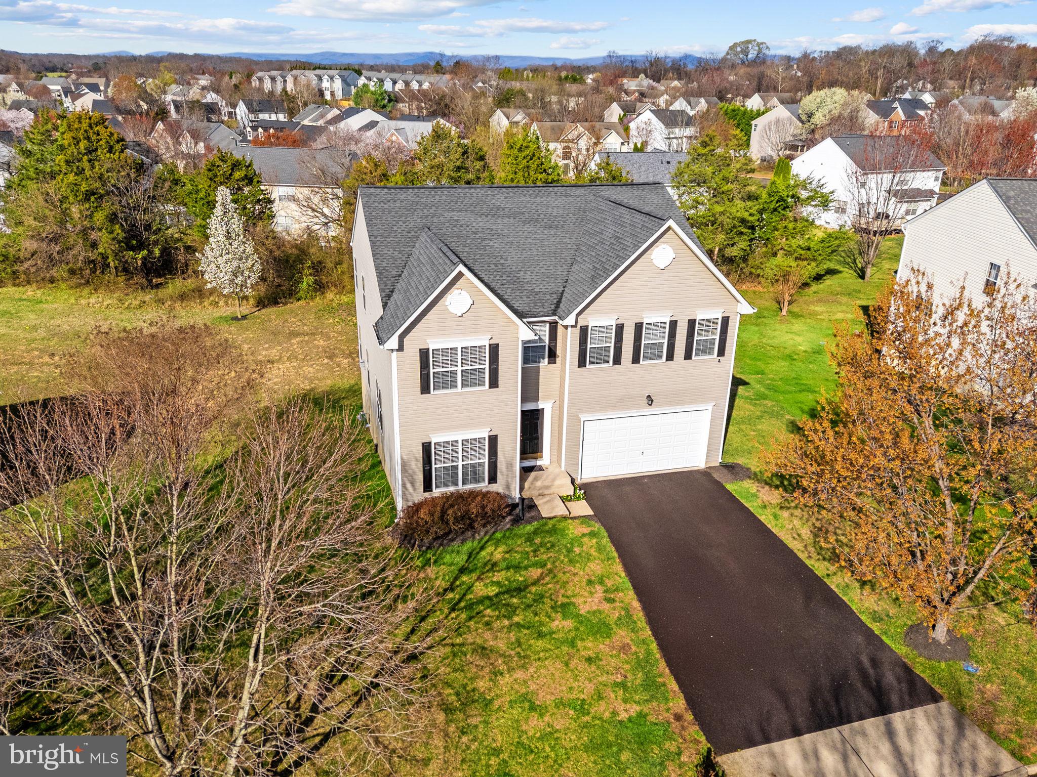 742 Blossom Tree Road Culpeper, VA 22701 - Photo 3 of 60 a aerial view of a house with a yard