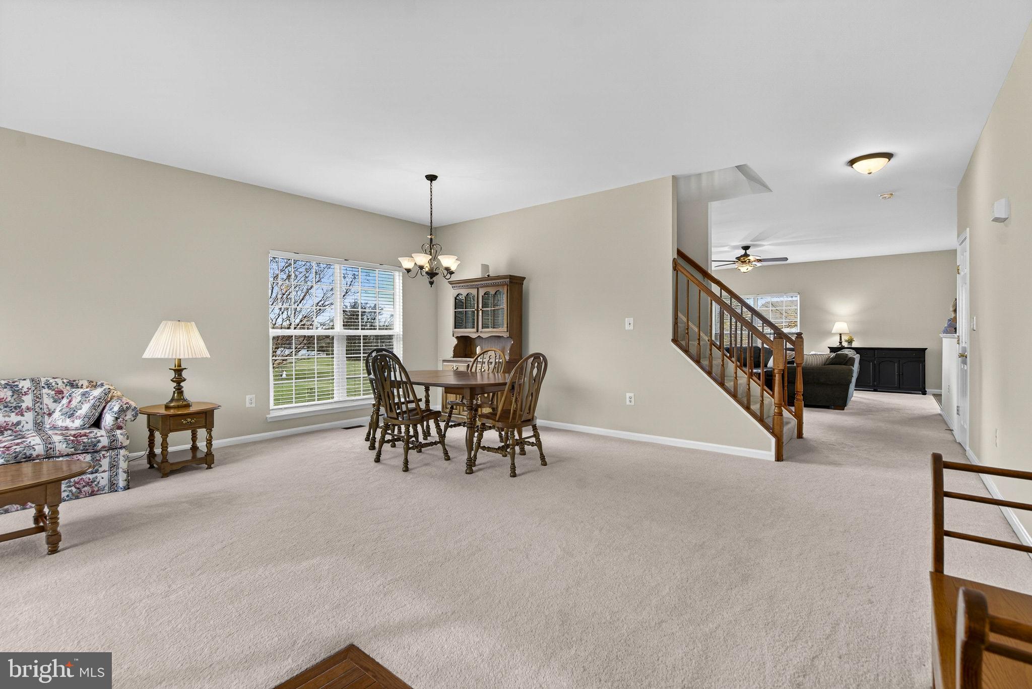 742 Blossom Tree Road Culpeper, VA 22701 - Photo 5 of 60 a view of a livingroom with furniture and a couch