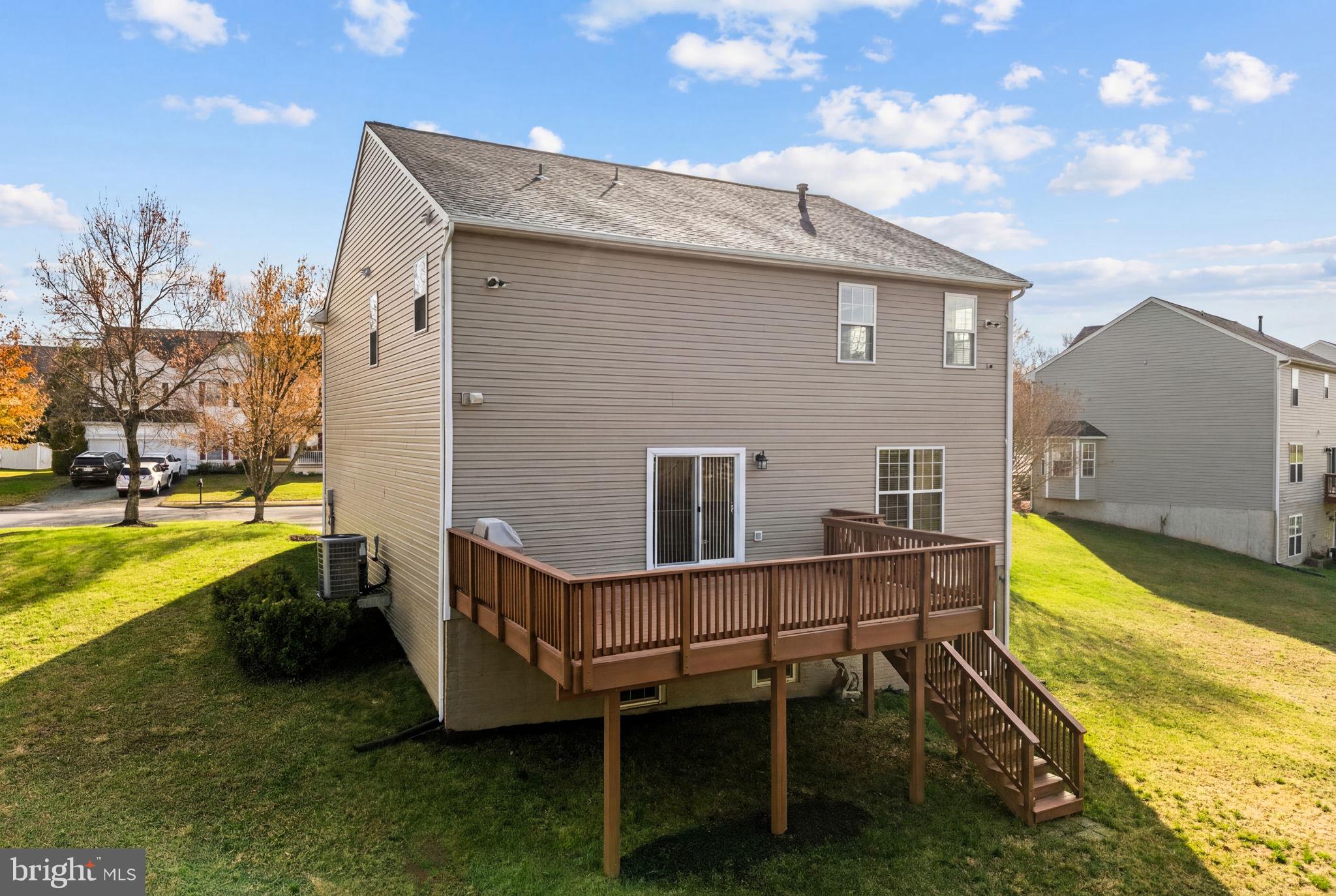 742 Blossom Tree Road Culpeper, VA 22701 - Photo 55 of 60 a view of a house with pool and chairs