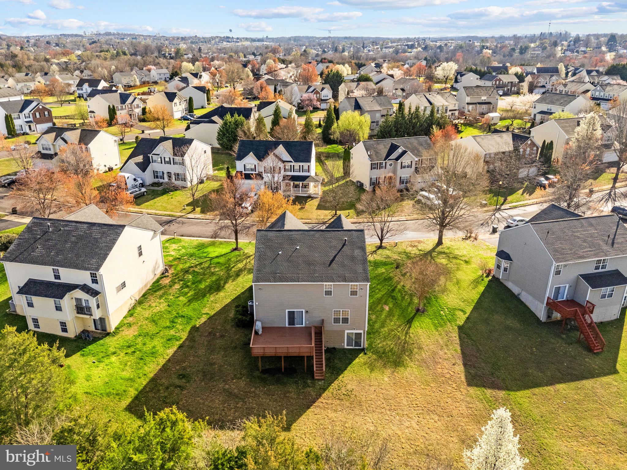 742 Blossom Tree Road Culpeper, VA 22701 - Photo 56 of 60 an aerial view of a house with a swimming pool yard and outdoor seating