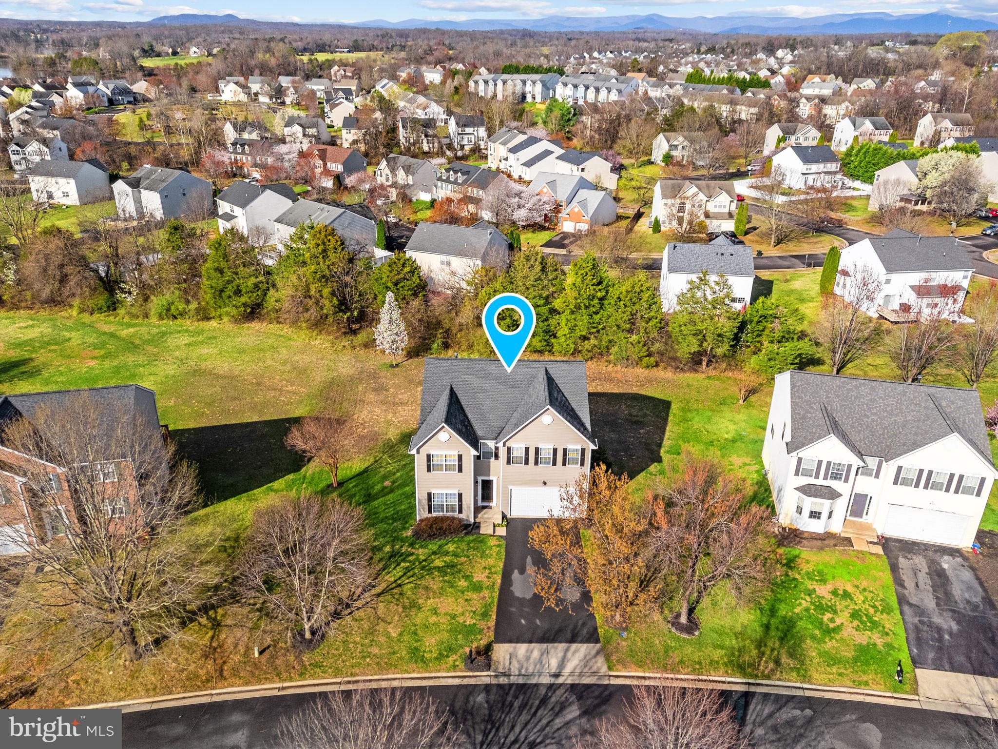 742 Blossom Tree Road Culpeper, VA 22701 - Photo 57 of 60 an aerial view of residential houses with outdoor space