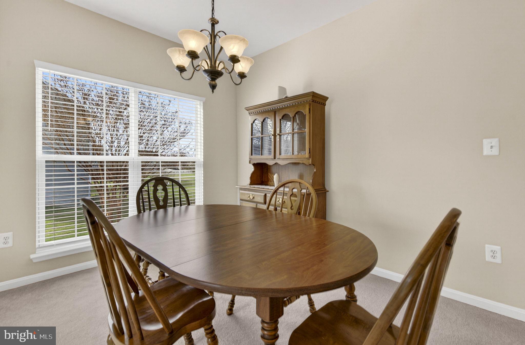 742 Blossom Tree Road Culpeper, VA 22701 - Photo 10 of 60 a dining room with furniture and window