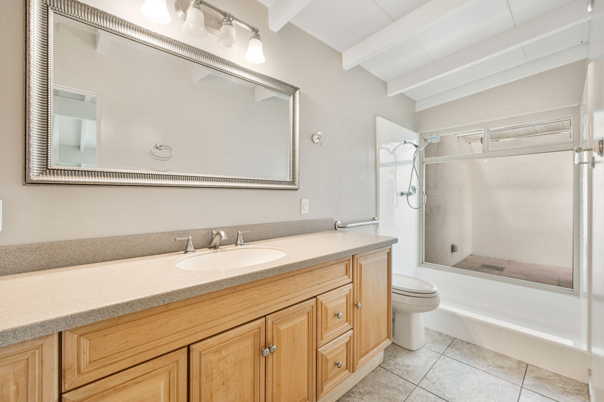71996 Vista Del Rio Rancho Mirage, CA 92270 - Photo 17 of 39 a bathroom with a granite countertop sink a toilet and bathtub