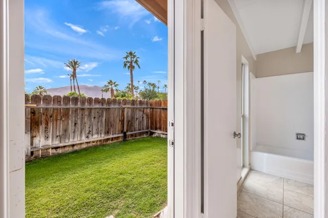 a view of a backyard with a garden