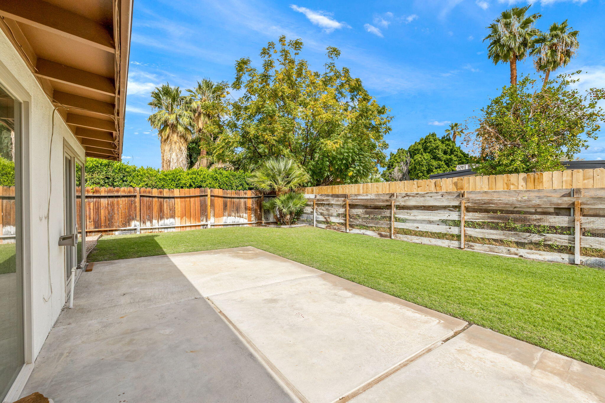 71996 Vista Del Rio Rancho Mirage, CA 92270 - Photo 25 of 39 a view of backyard with green space