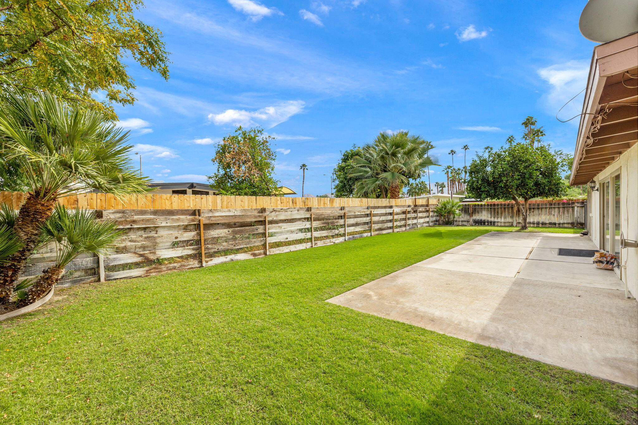 71996 Vista Del Rio Rancho Mirage, CA 92270 - Photo 27 of 39 a view of a garden with an outdoor space