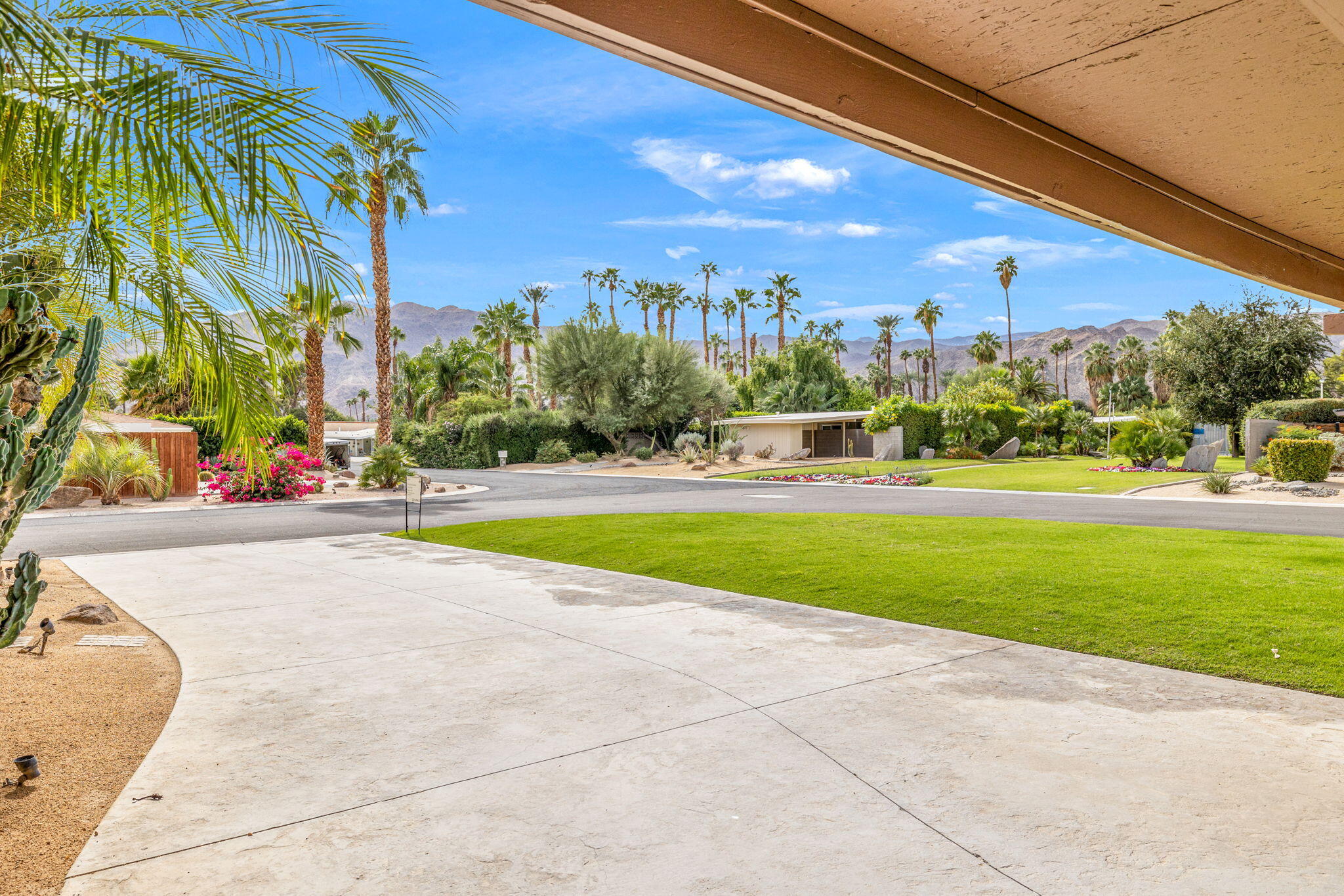 71996 Vista Del Rio Rancho Mirage, CA 92270 - Photo 35 of 39 a view of a swimming pool with an outdoor seating