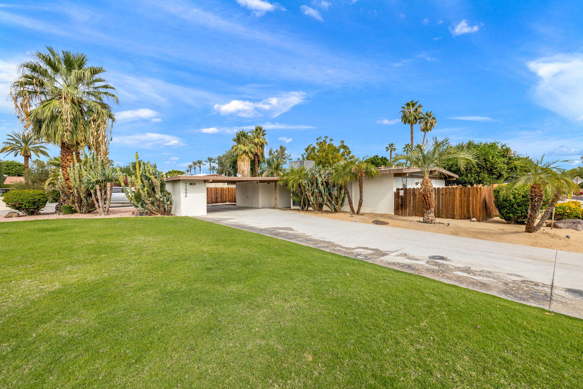 71996 Vista Del Rio Rancho Mirage, CA 92270 - Photo 36 of 39 a front view of a house with a yard