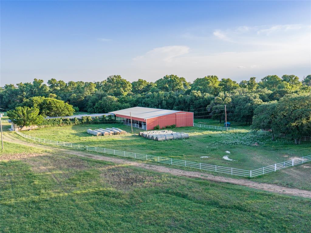 449 Private Road 4670 Rhome, TX 76078 - Photo 24 of 39 a aerial view of a house with big yard