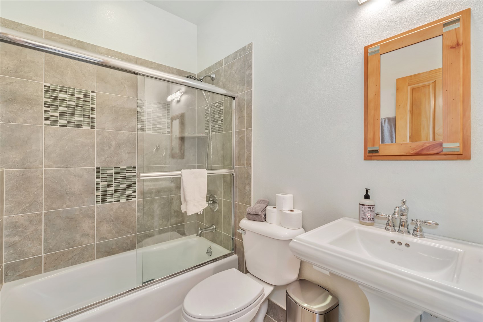 31485 Deerwood Ranch Road Steamboat Springs, CO 80487 - Photo 41 of 49 a bathroom with a bathtub shower sink mirror and toilet