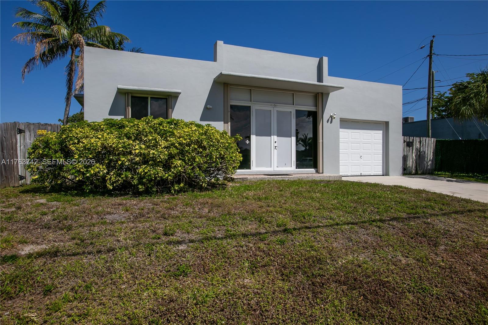 4750 Southwest 43rd Avenue Dania Beach, FL 33314 - Photo 1 of 28 a view of a house with a garden