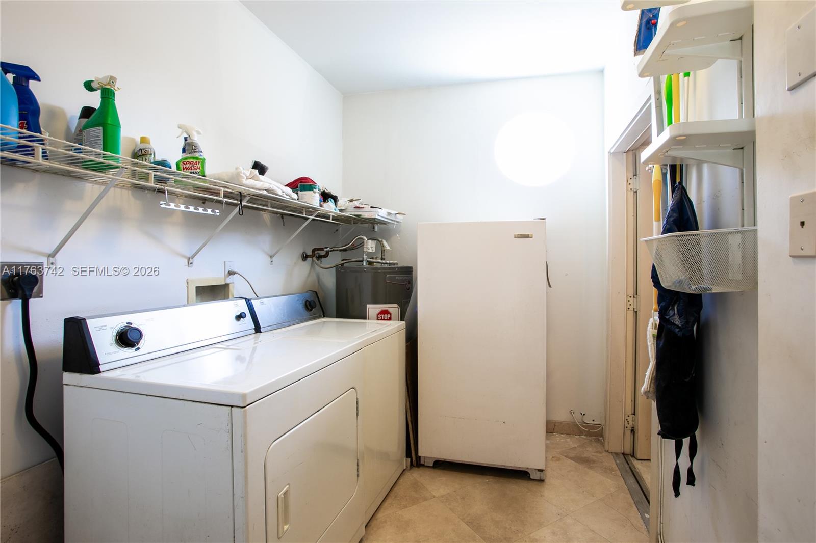 4750 Southwest 43rd Avenue Dania Beach, FL 33314 - Photo 24 of 28 a utility room with dryer and washer