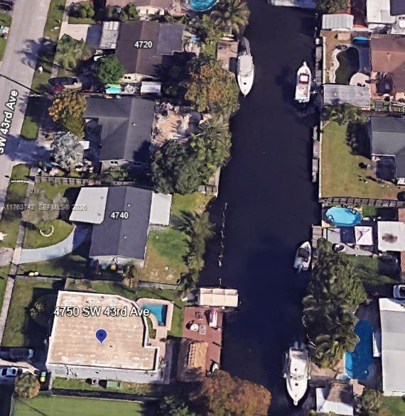 4750 Southwest 43rd Avenue Dania Beach, FL 33314 - Photo 25 of 28 an aerial view of residential house with outdoor space and parking