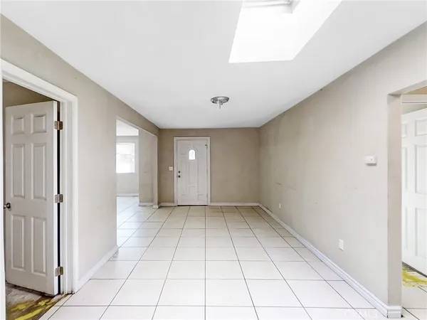 a view of an empty room with window