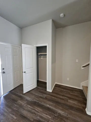 a view of livingroom and hardwood floor