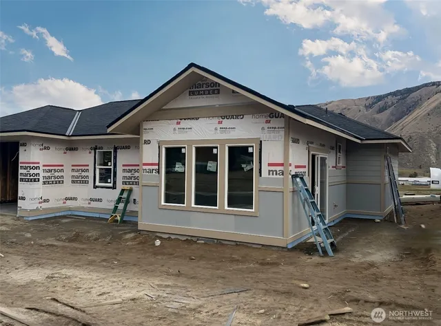 a front view of a house with a garage
