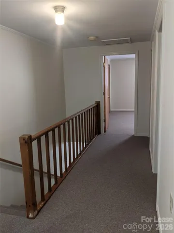 a view of hallway with stairs