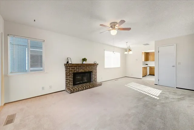 a view of a hallway with washer and dryer