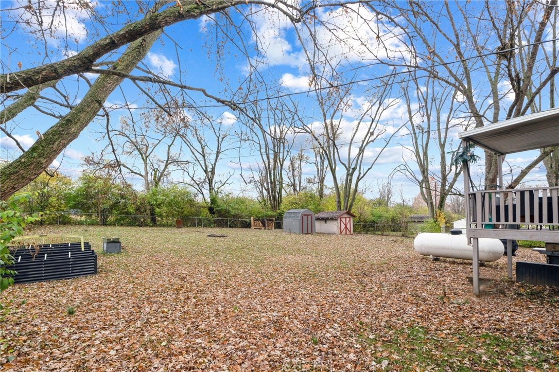 8180 Manning Road Germantown, OH 45327 - Photo 36 of 39 This spacious backyard offers ample room for outdoor activities and future enhancements.