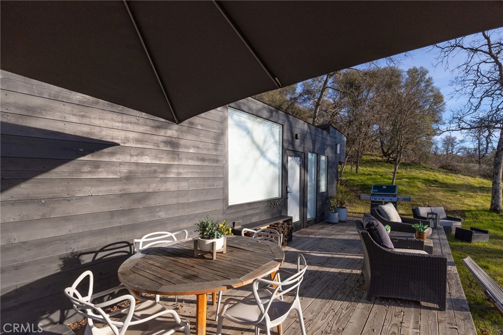 33940 Jennifer Way Coarsegold, CA 93614 - Photo 26 of 75 a table and chairs in the patio