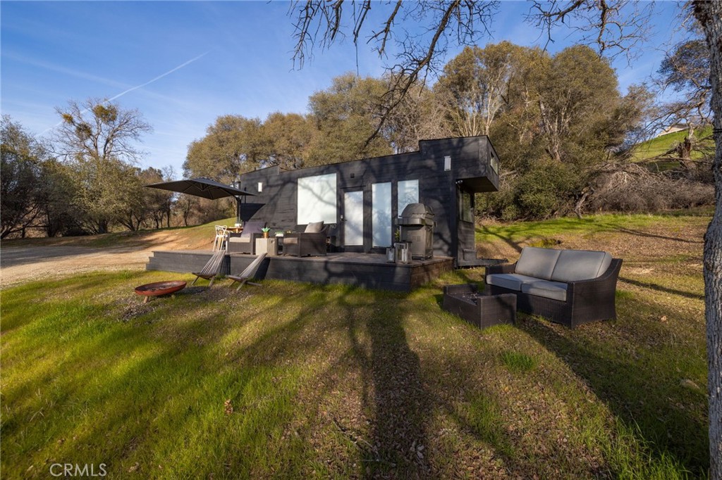 33940 Jennifer Way Coarsegold, CA 93614 - Photo 34 of 75 a view of a swimming pool with lounge chairs