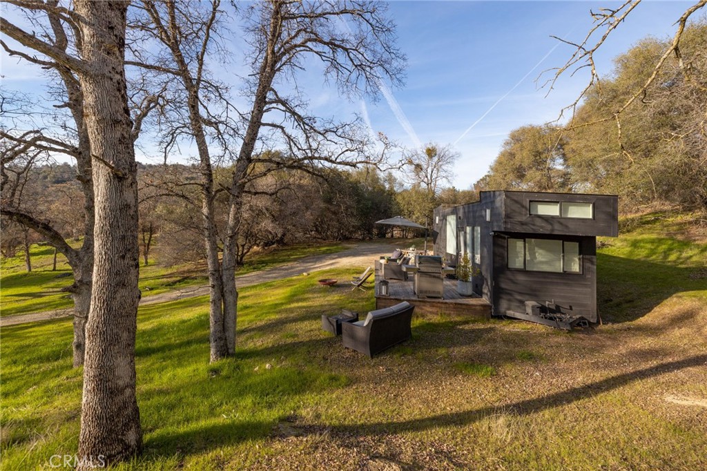 33940 Jennifer Way Coarsegold, CA 93614 - Photo 35 of 75 a view of a swimming pool with a patio