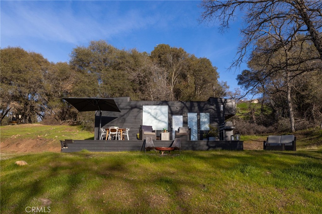 33940 Jennifer Way Coarsegold, CA 93614 - Photo 41 of 75 a view of a house with a yard